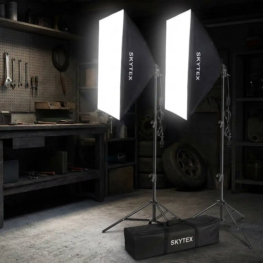 Bright softboxes illuminate a dimly lit garage studio with high-contrast, harsh lighting. Bright softboxes illuminate a dimly lit garage studio with high-contrast, harsh lighting.